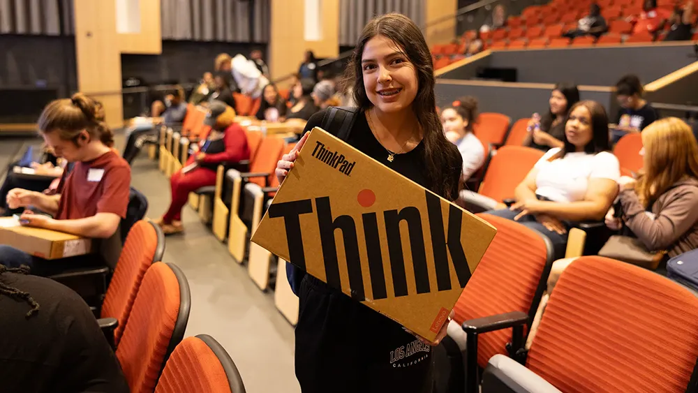 Students in the Eagle Start program receive free laptop computers.