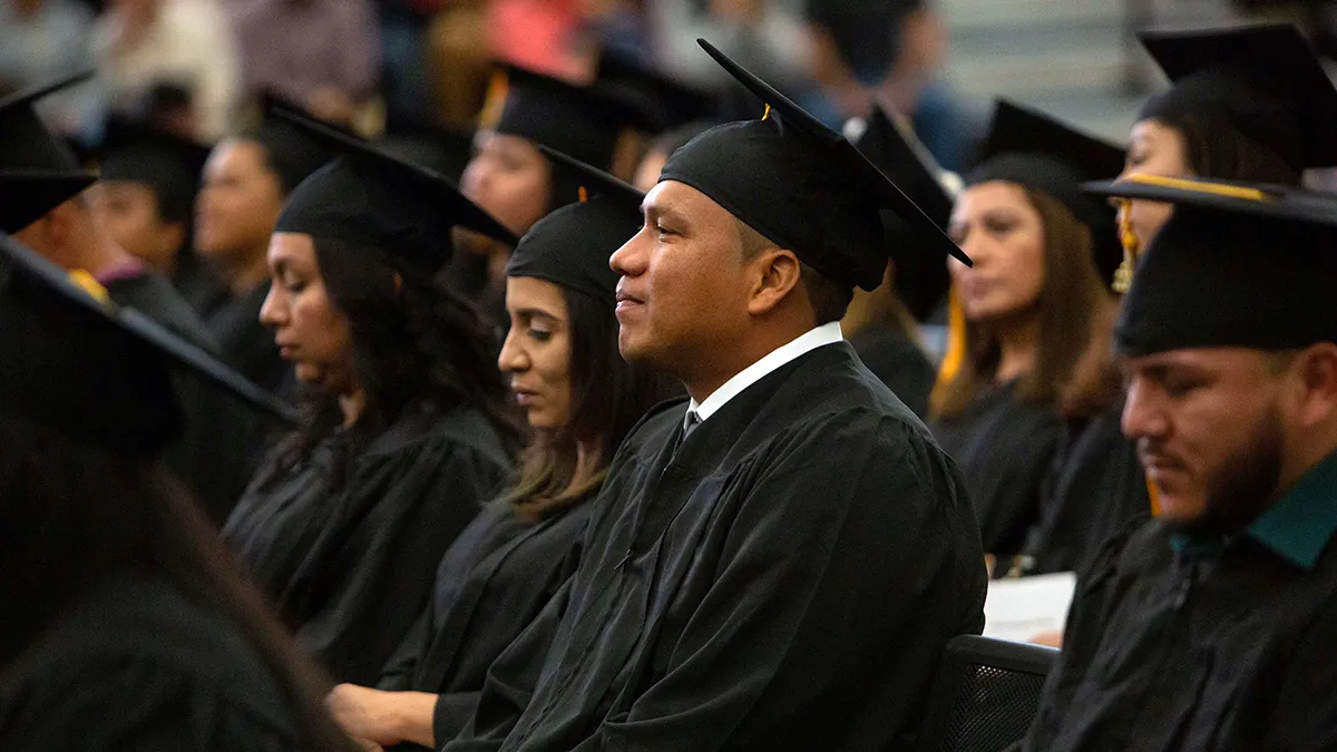 Graduates celebrate earning their high school credentials at Wake Tech.