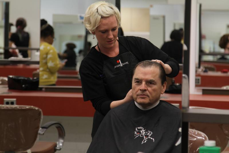 President Dr. Stephen Scott joined members of the Student Government Association getting haircuts in the college Cosmetology Salon.