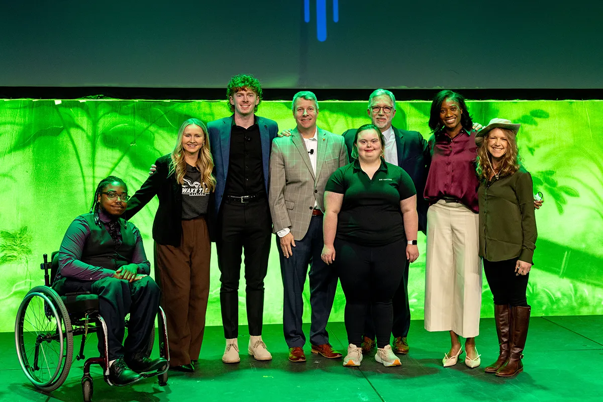 Wake Tech officials pose with students and graduates honored at the 2025 Wake Tech IGNITE event.