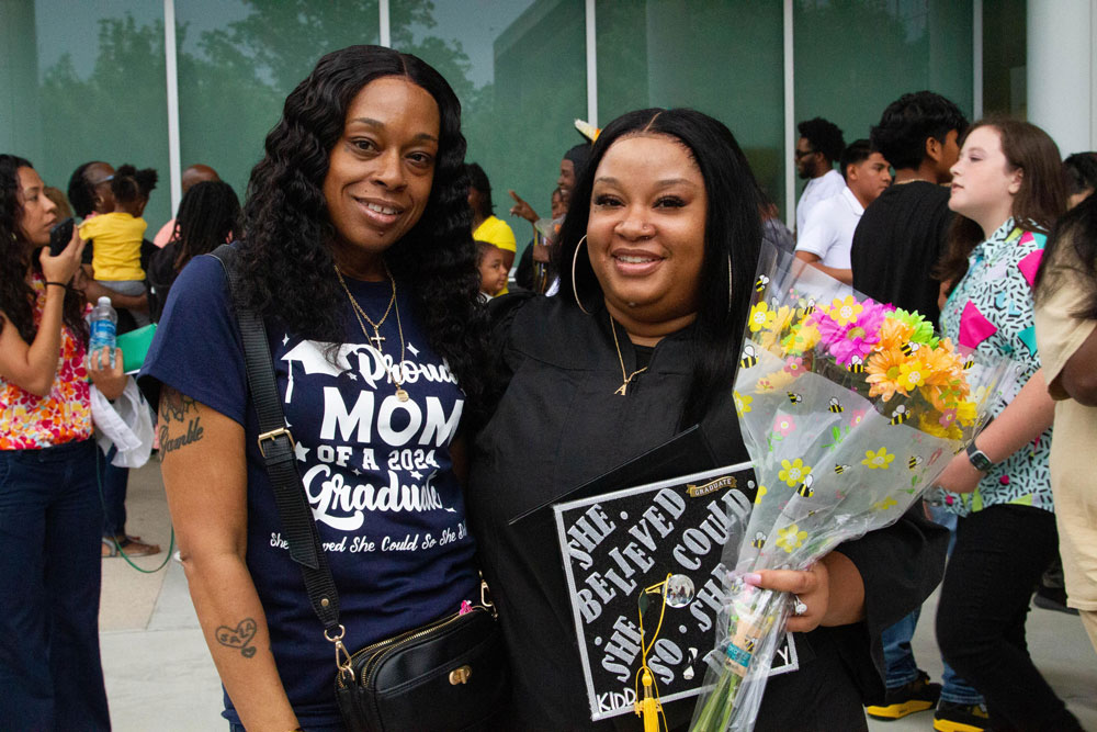 A Wake Tech Adult High School graduate poses with her mother.