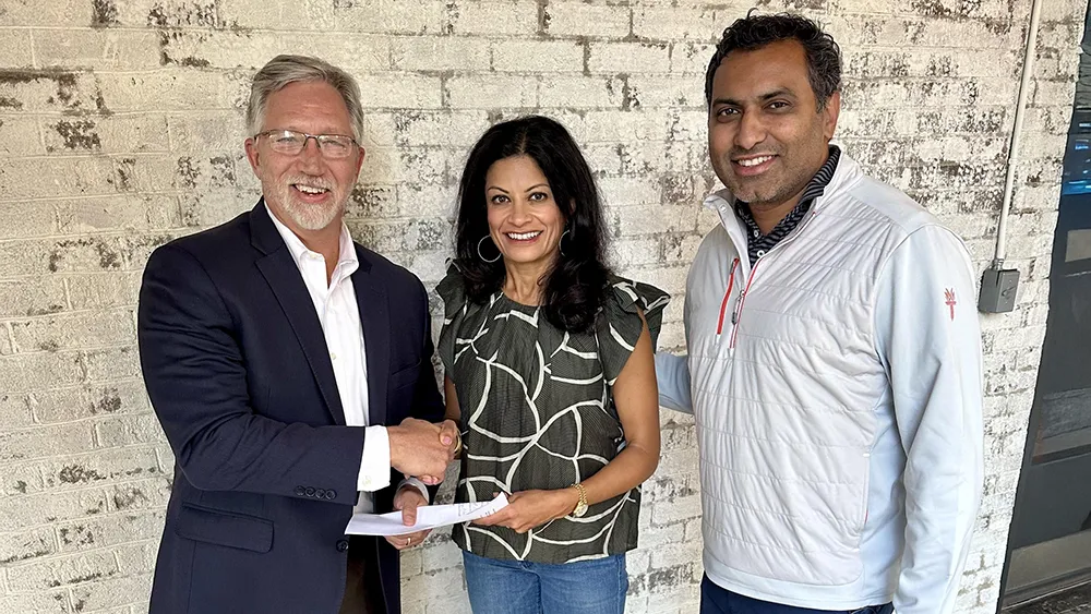 Wake Tech President Dr. Scott Ralls, left, with Dr. Lavanya and Sharat Nagaraj to celebrate the Nagaraj Family Nest Endowment.