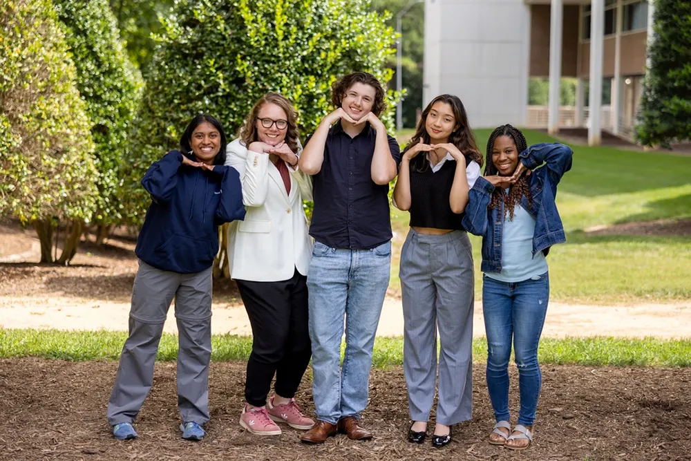 Five Wake Tech Peer Leaders pose for a photo.