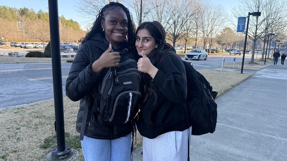 Two Wake Tech students enjoy the first day of class at Scott Northern Wake Campus.