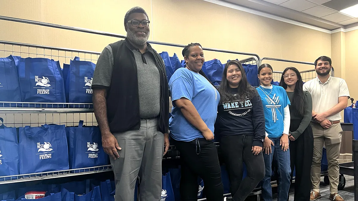 Wake Tech volunteers packed 300 bags so students in need can prepare a Thanksgiving dinner.