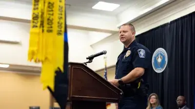 Wake Tech President Dr. Scott Ralls speaks to Basic Law Enforcement Training Academy graduates.