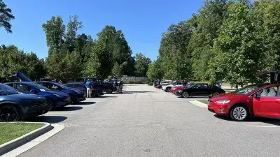 Electric vehicles are celebrated during a car show at the Hendrick Center for Automotive Excellence on Scott Northern Wake Campus.