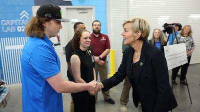 U.S. Energy Secretary Jennifer Granholm greets a Wake Tech student.