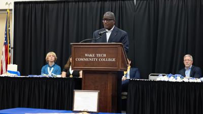 State Rep. James Roberson speaks at Wake Tech's Phi Theta Kappa induction ceremony.
