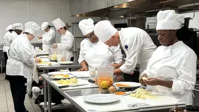 Wake Tech Culinary Arts students prepare meals in the Southern Wake Campus kitchen.