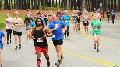 Participants race in the 2024 Fostering Footsteps event to support Wake Tech's Fostering Bright Futures program.