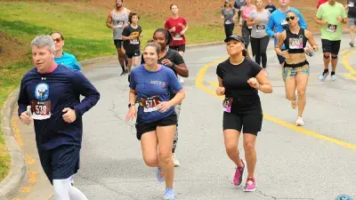 Participants race in the 2024 Fostering Footsteps event to support Wake Tech's Fostering Bright Futures program.