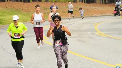 Participants race in the 2024 Fostering Footsteps event to support Wake Tech's Fostering Bright Futures program.