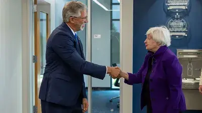 U.S. Treasury Secretary Janet Yellen takes North Carolina Gov. Roy Cooper for a ride in an electric vehicle.