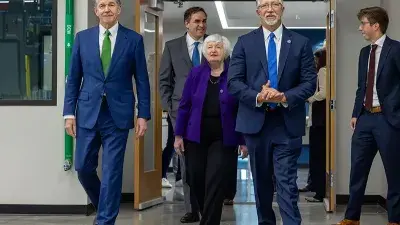 U.S. Treasury Secretary Janet Yellen takes North Carolina Gov. Roy Cooper for a ride in an electric vehicle.