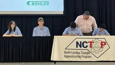 Wake Tech President Dr. Scott Ralls speaks to apprentices at the NCTAP ceremony.