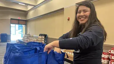 Wake Tech volunteers packed 300 bags so students in need can prepare a Thanksgiving dinner.